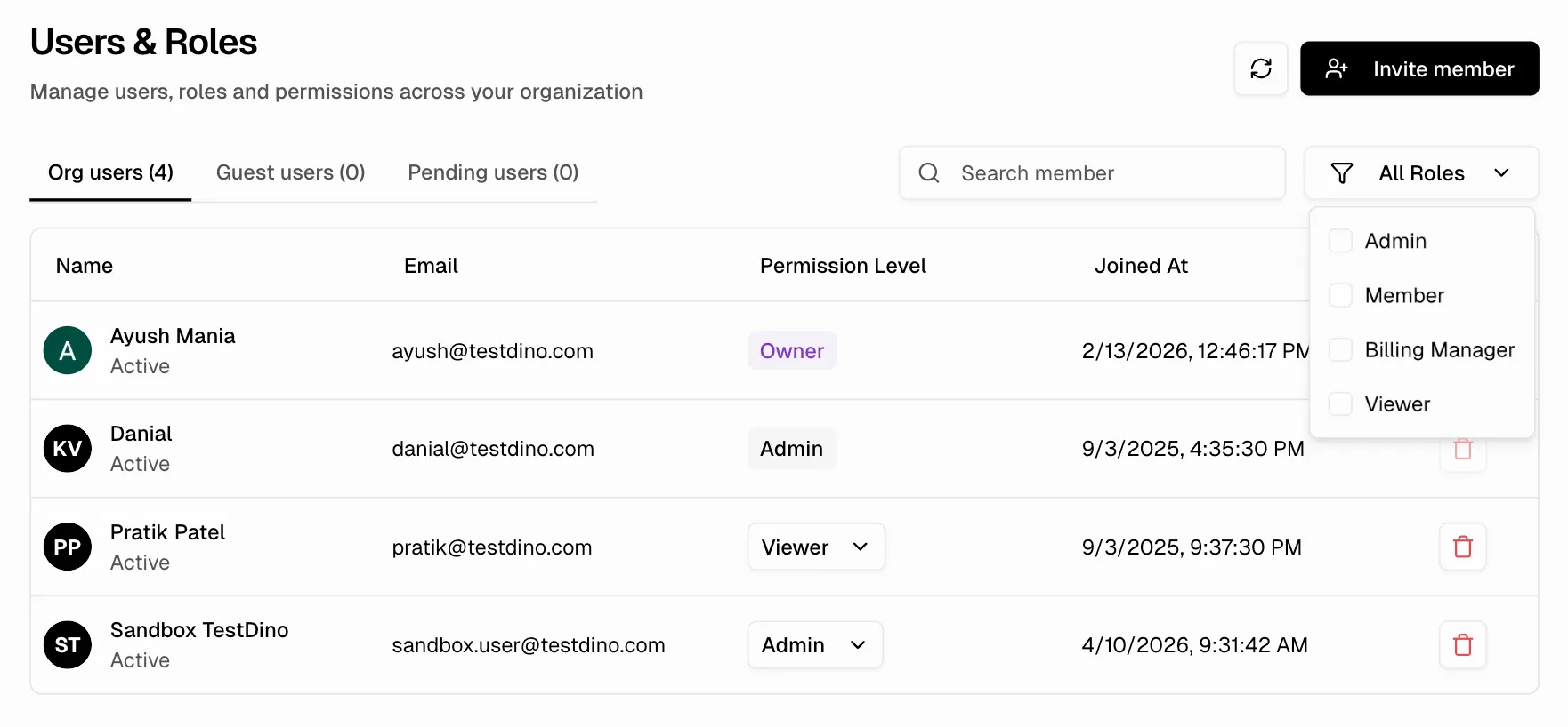 Users & Roles page showing member list with role dropdowns, invite button, and filter controls
