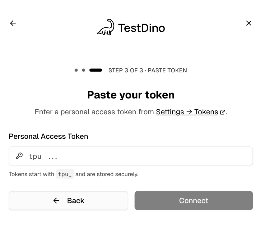 TestDino OAuth Step 3 of 3 Paste your token dialog with a Personal Access Token input prefilled with tpu_ and a Connect button